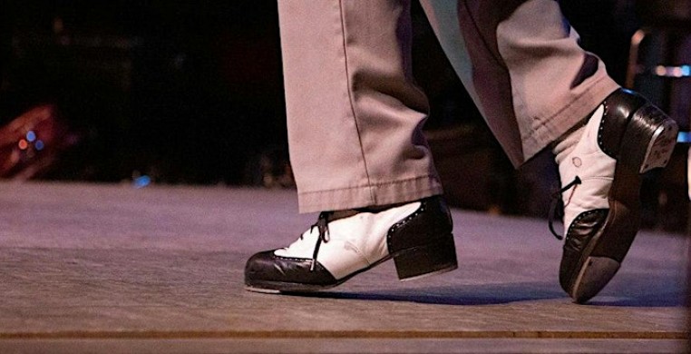 Jumaane Taylor's feet tap dancing on the Jazz Showcase stage.