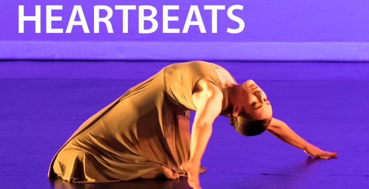 Posed dancer with the text 'Spectral Heartbeats' above
