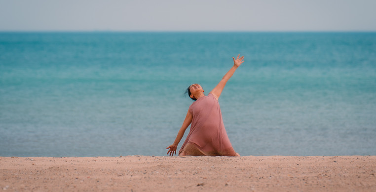 Ayako Kato dancing on the South Shore Beach, Chicago, IL