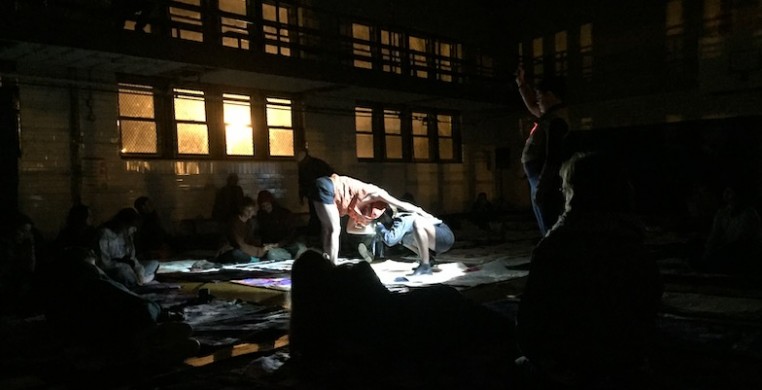 A moment inside the Calumet Park field house from "Then a Cunning Voice" in the middle of the night, photo courtesy of the Dance Center