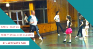 Young dancers in a wood paneled studio space face a mirror while a teacher and assistant demonstrate at the front.