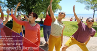 Text reads, “Crosswalk Dances Sat July 15th 1:30 - 3:30 PM Lincoln Park 2045 N Lincoln Park West, Chicago, IL 60610”. Photo shows Synapse Arts dancers in bright colored shirts and pants reaching up with their right arms. 